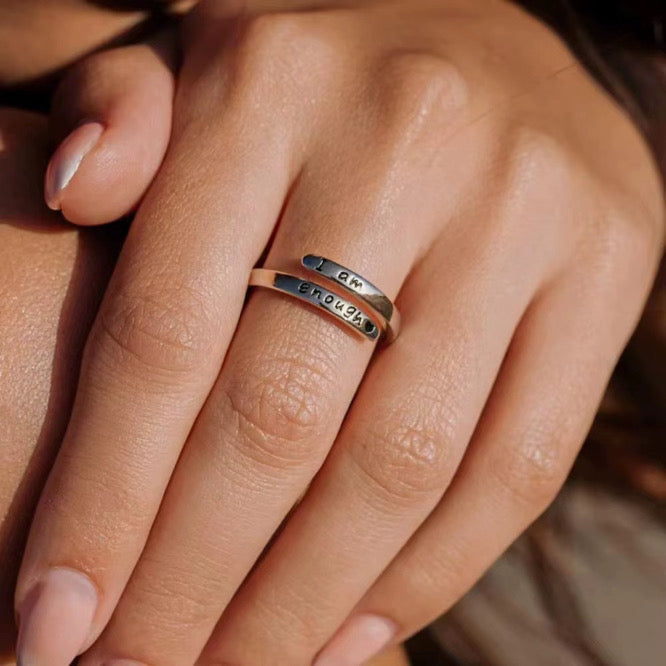 I Am Enough Ring worn on hand, close-up