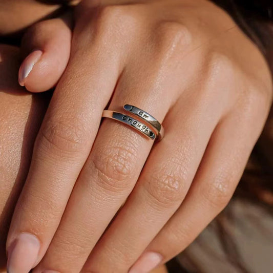 I Am Enough Ring worn on hand, close-up